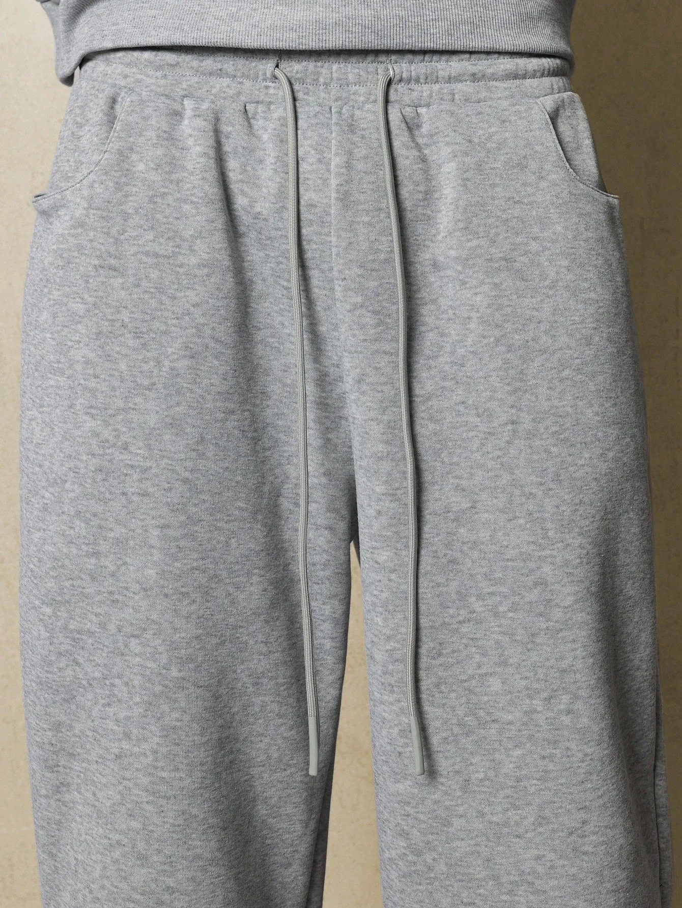 Crop Fit Overhead Hoodie And Sweatpants With Small Embroidery Pattern & Drawstrings 2 Piece Set