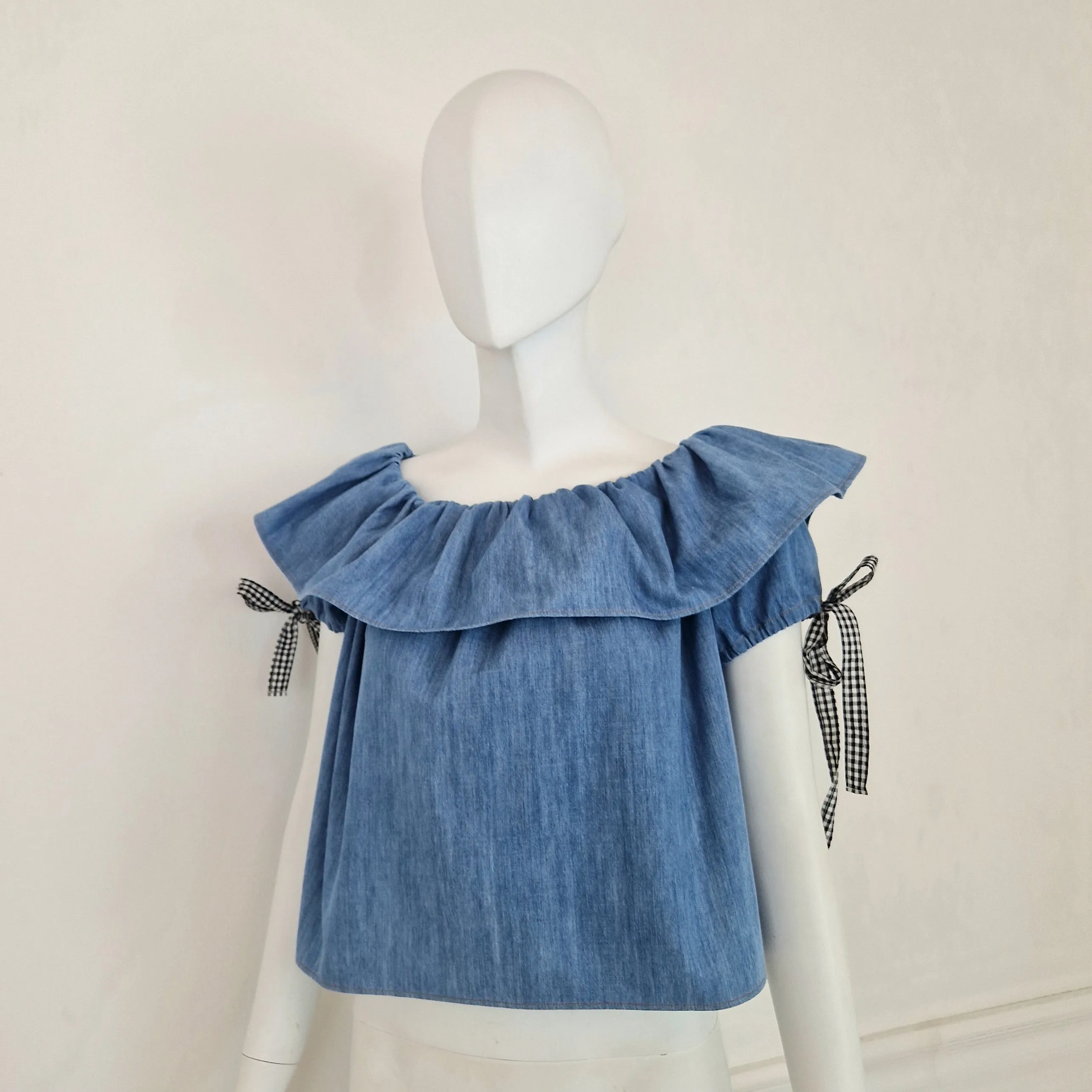 Miu Miu | Top in denim con fiocchetti