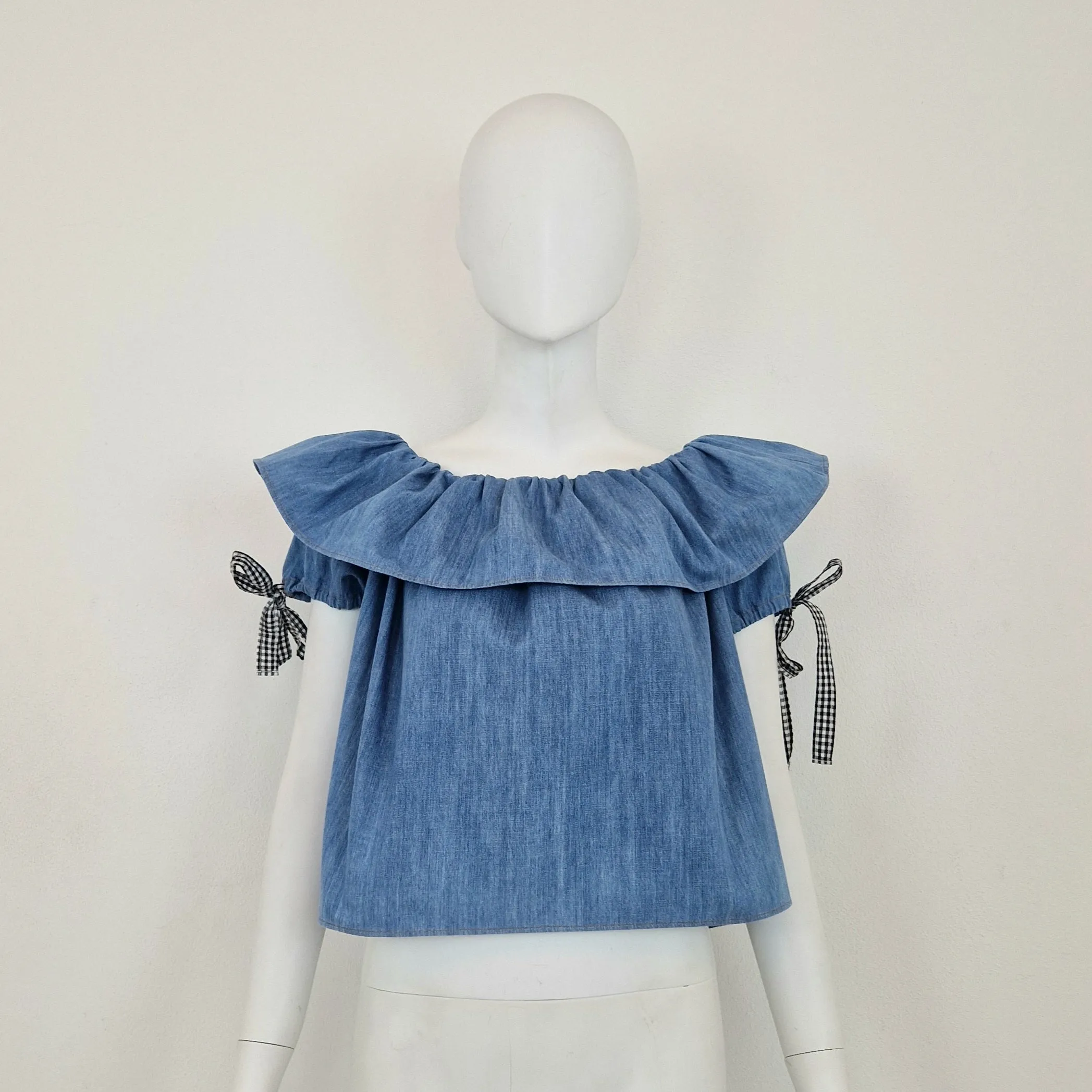 Miu Miu | Top in denim con fiocchetti