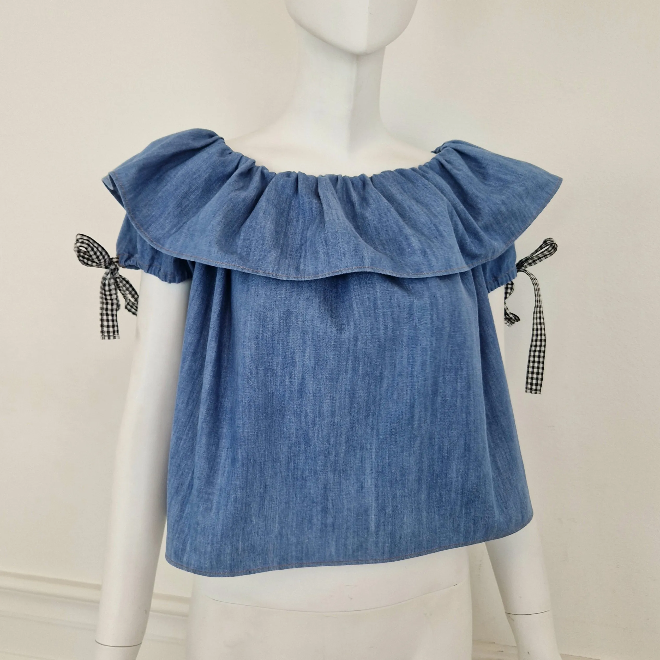 Miu Miu | Top in denim con fiocchetti