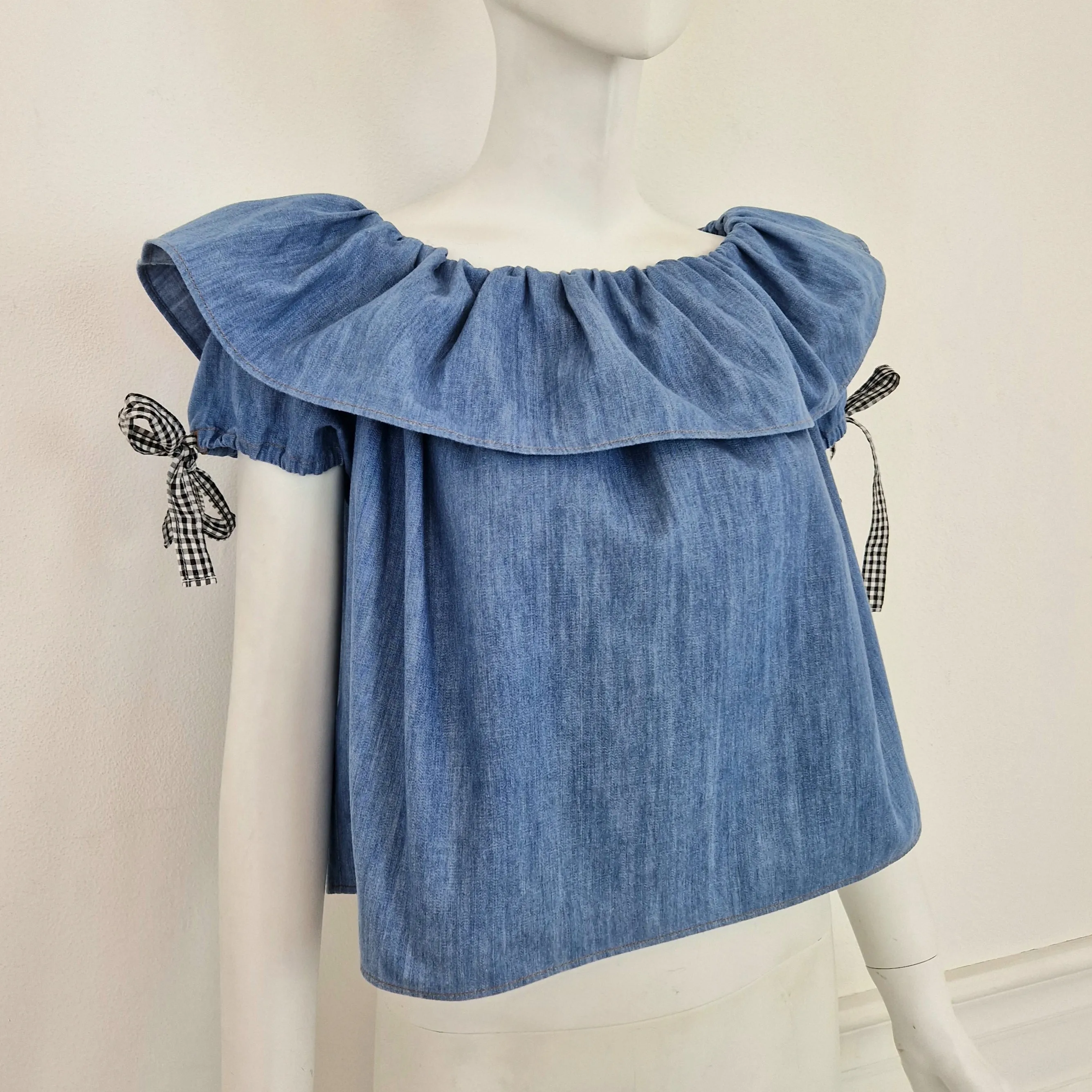 Miu Miu | Top in denim con fiocchetti